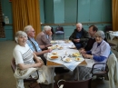 A group of friends enjoy lunch