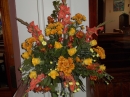 Welcoming harvest flowers in the porch